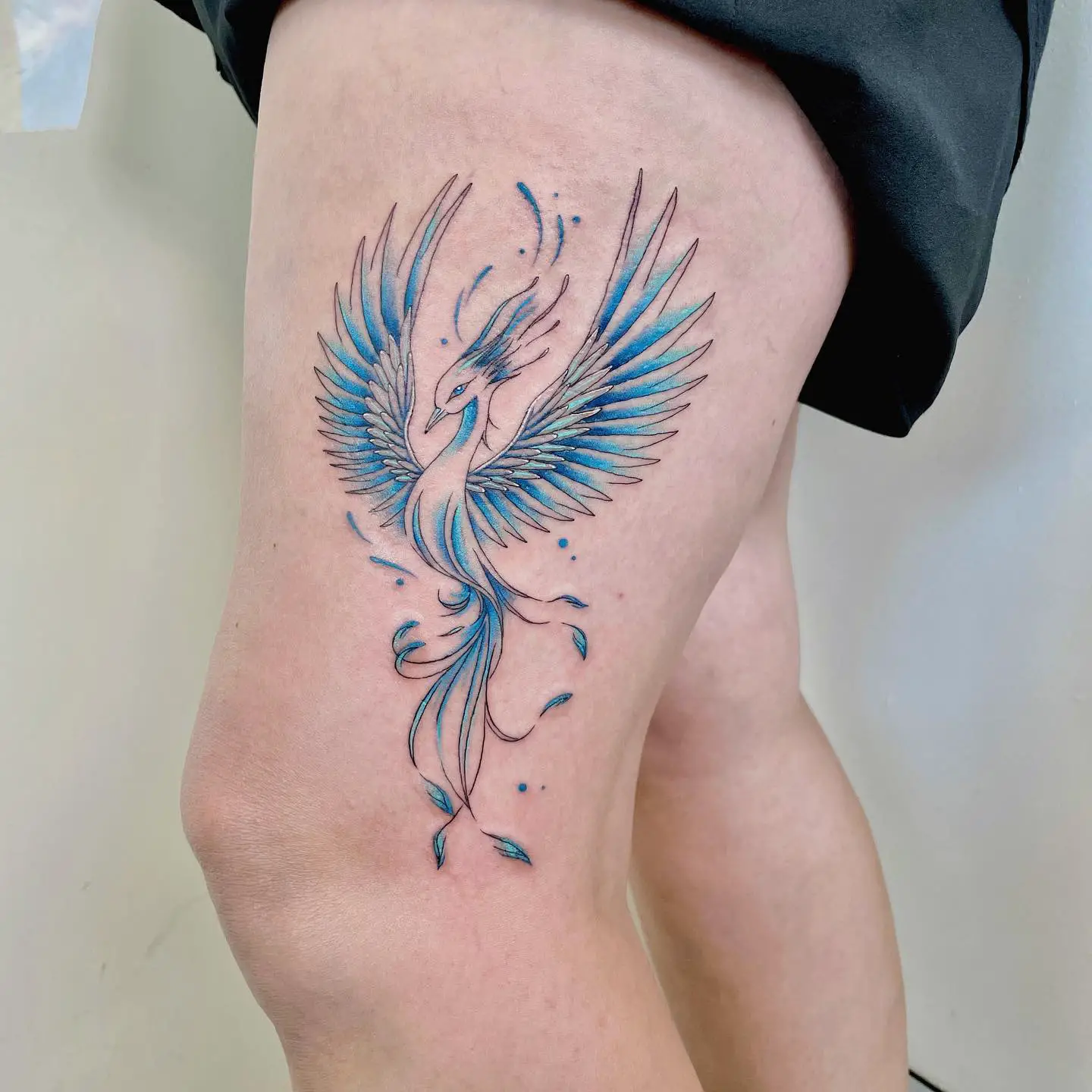 Blue phoenix tattoo by ariel.tattoo.y