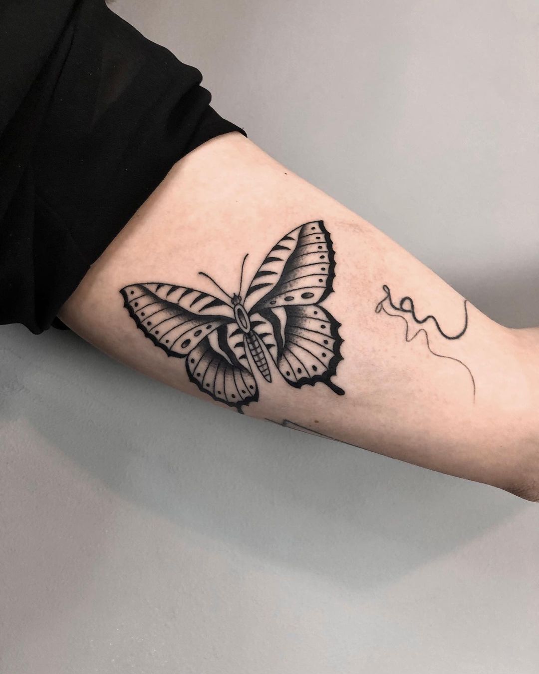 Butterfly tattoo by