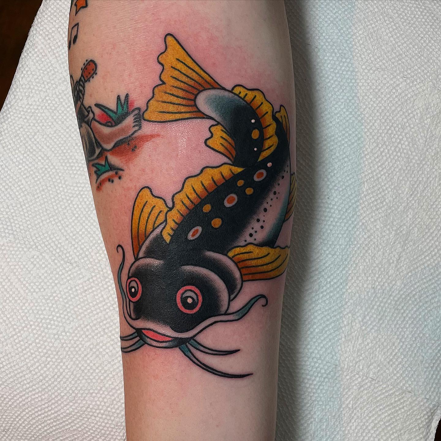 catfish pabst blue ribbon color arm tattoo by Jon von Glahn TattooNOW