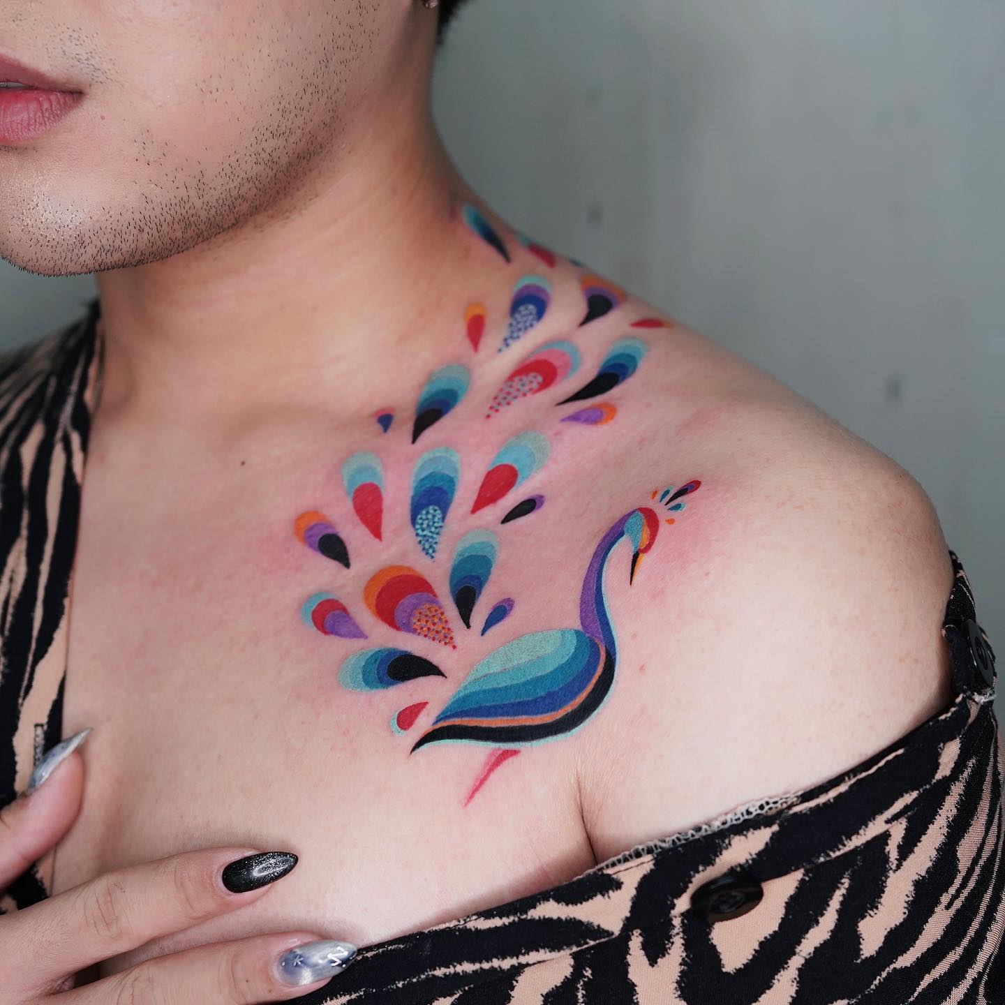 Colorful Peacock tattoo by artist... - Golden Anchor Tattoos | Facebook