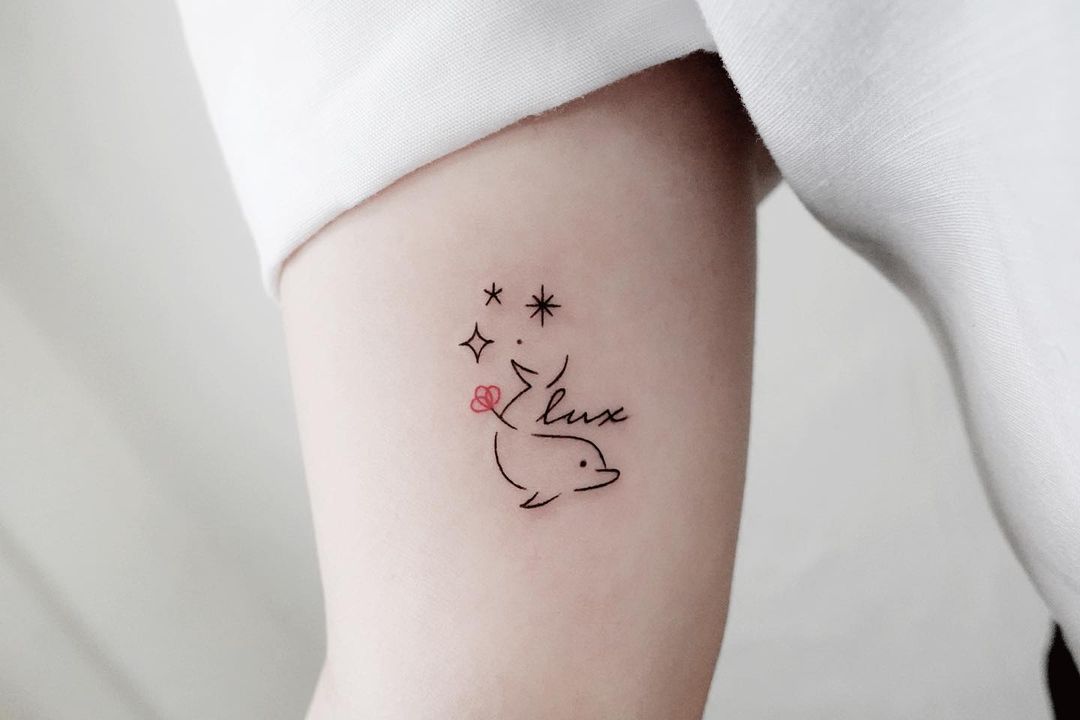 Cute dolphin tattoo by nieun tat2