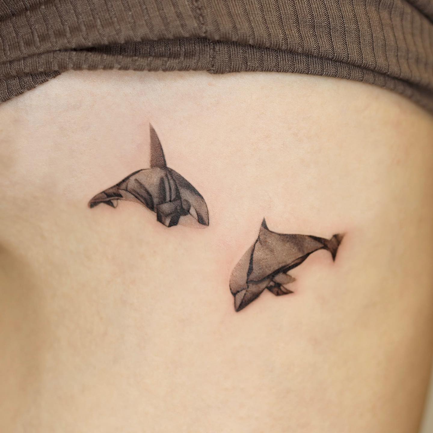 Cute dolphin tattoo by yoohwa tt