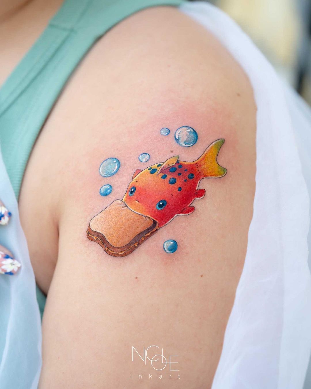 Cute fish tattoo by nicole inkart
