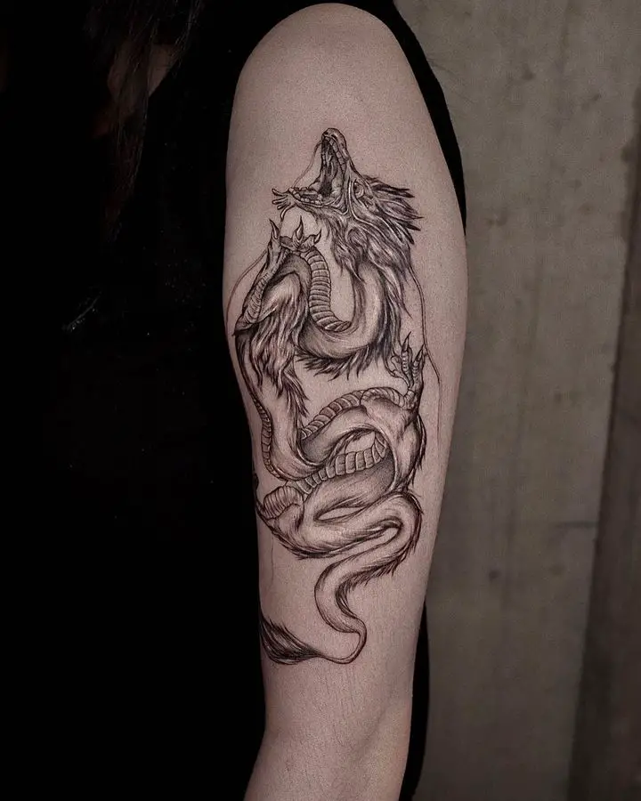 Dragon tattoo by pov tattoo