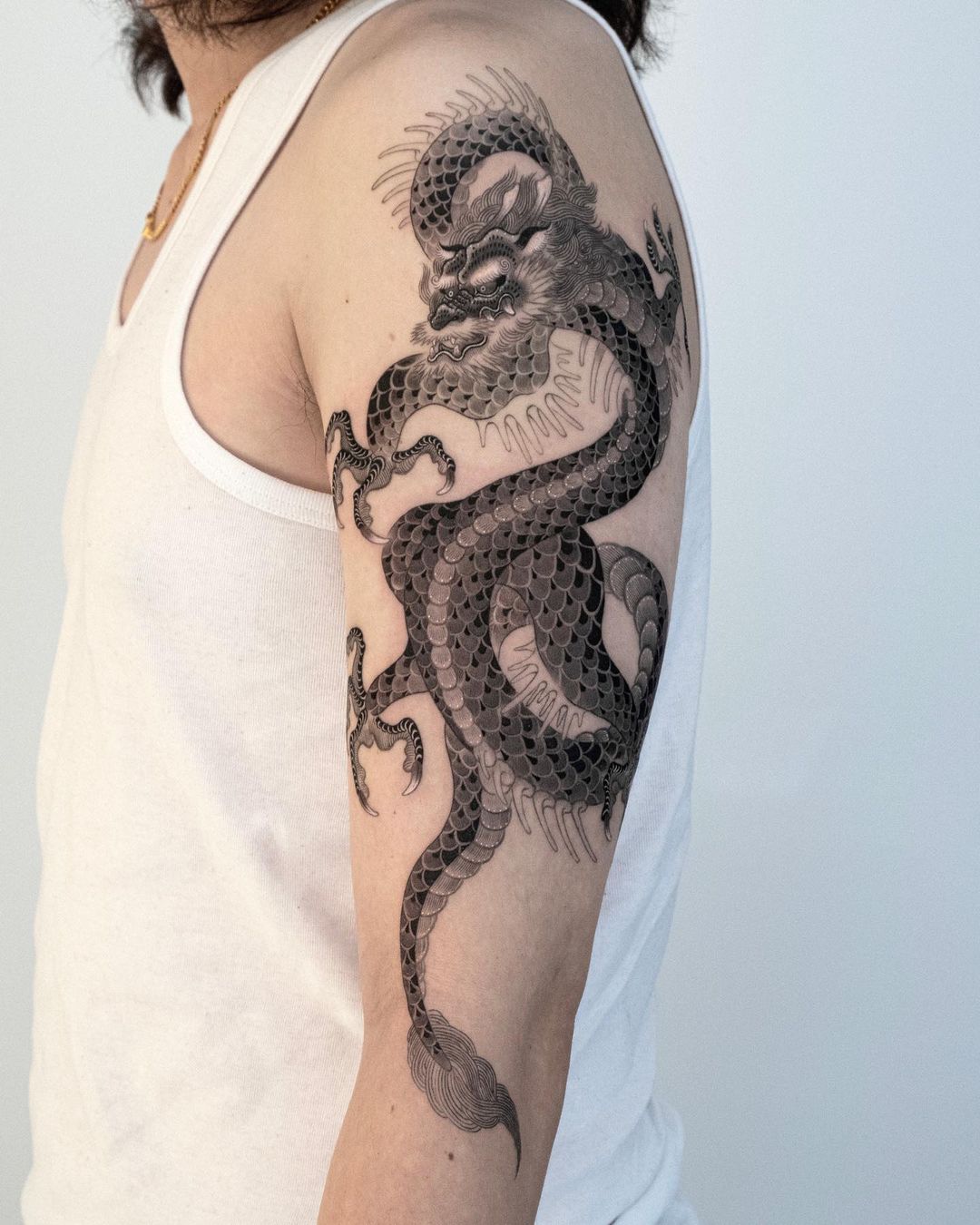 Dragon tattoo on arm by dokgonoing