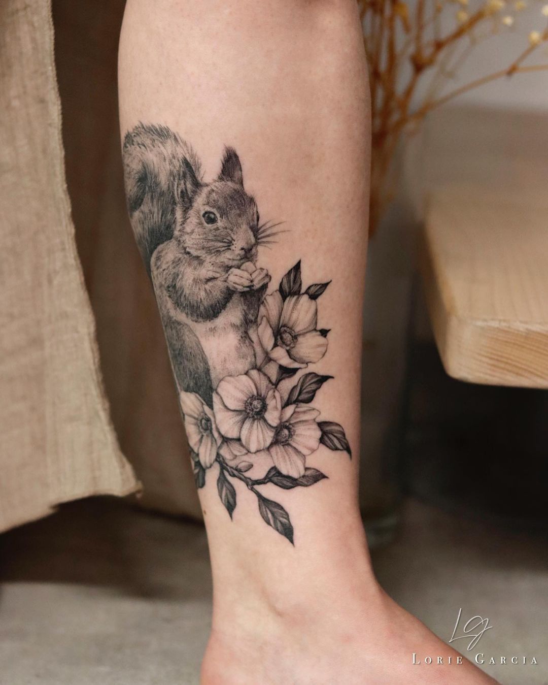 FLoral squirrel tattoo by lorie garcia tattoo