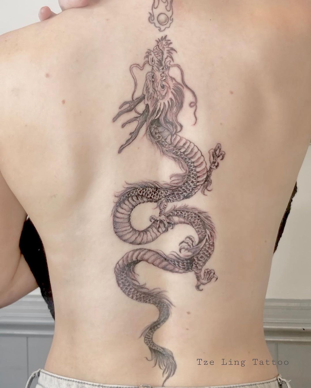Fineline dragon tattoo by colchestertattoo