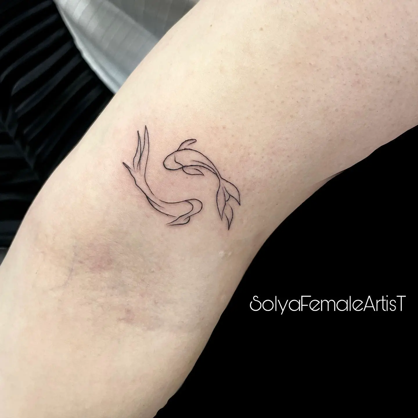 Fineline fish tattoo by solyafemaleartist