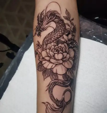 Floral dragon tattoo by
