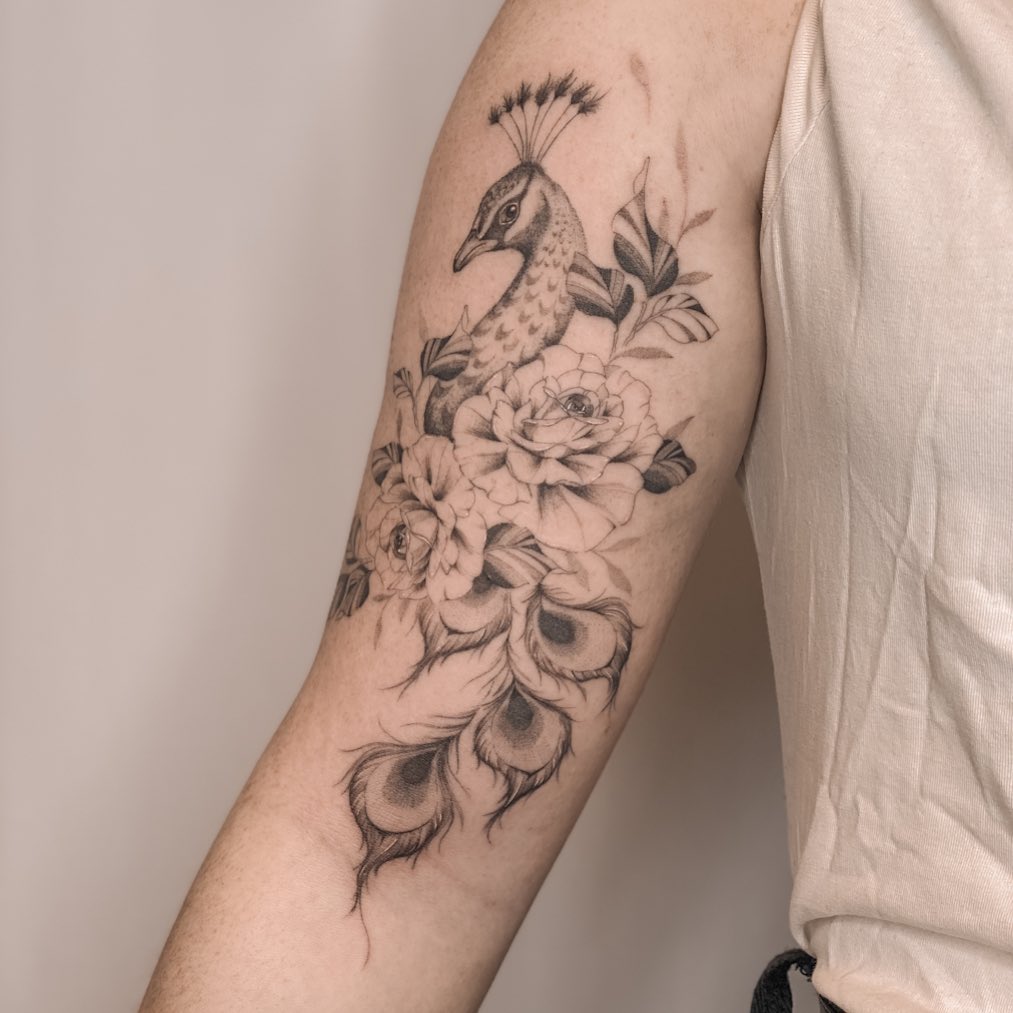 Floral pecock tattoo by bakken tattoo
