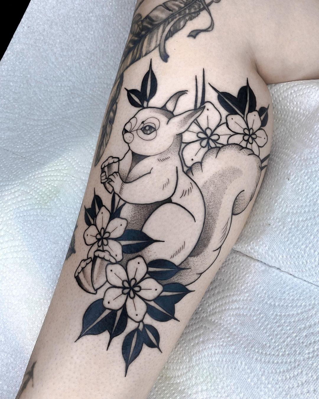 Floral squirrel tattoos by alber.haupt