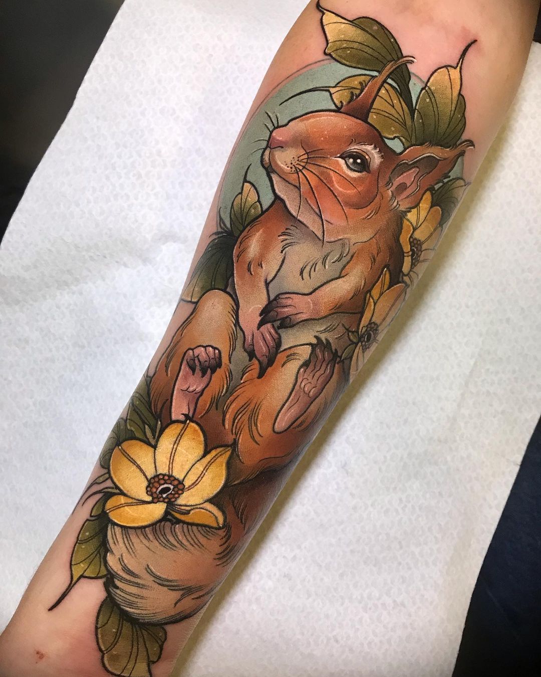 Floral squirrel tattoos by karolina.wilczewska.tattoo