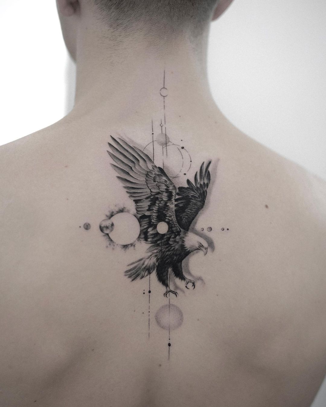 Geometric eagle tattoo by bartektattoo
