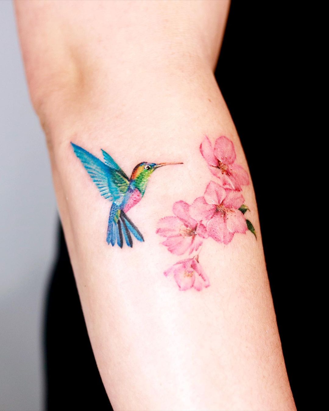 Humming bird tattoos by guseul tattoo
