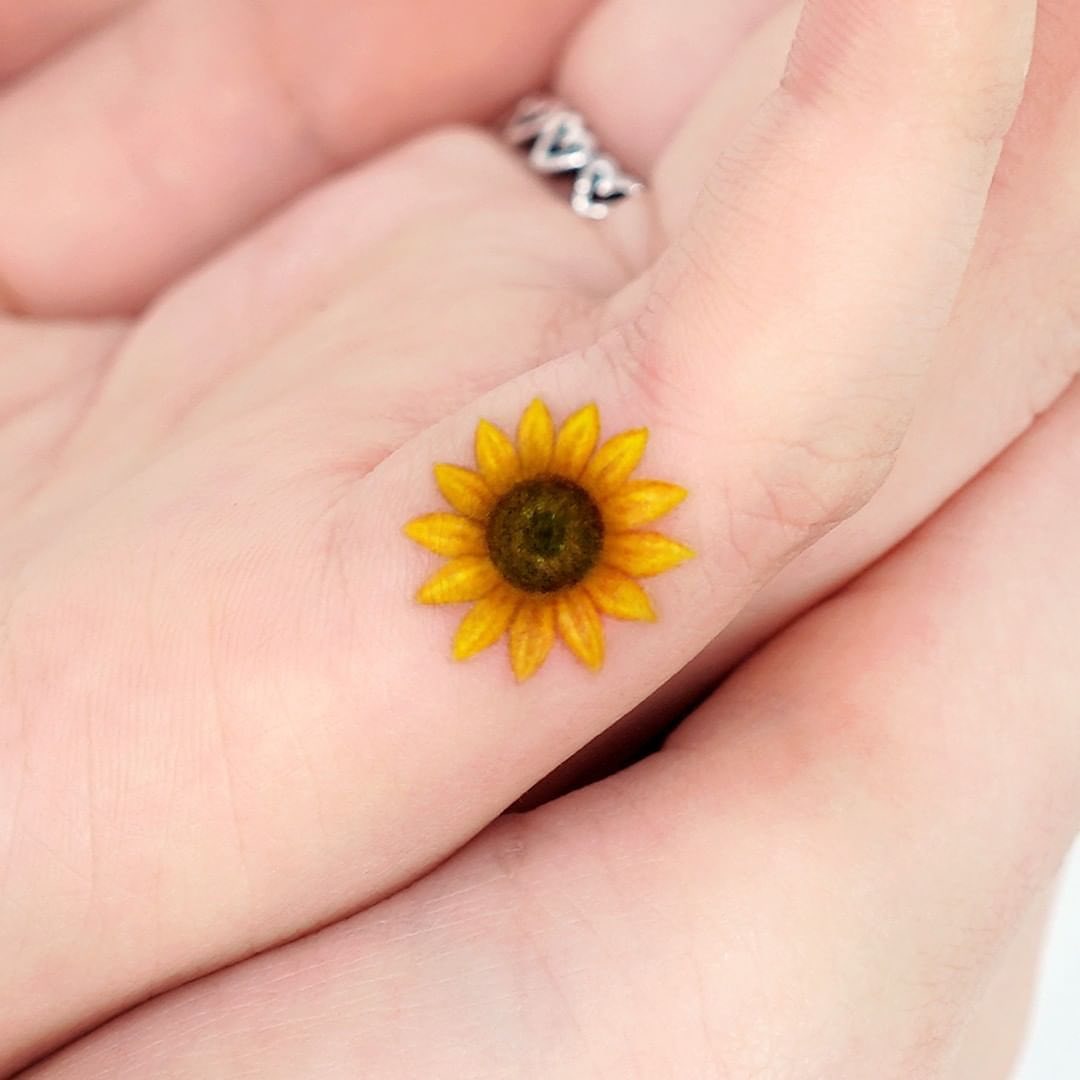 Mini sunflower tattoo by e.ple .tattoo