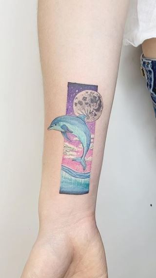 Moon dolphin tattoo 1