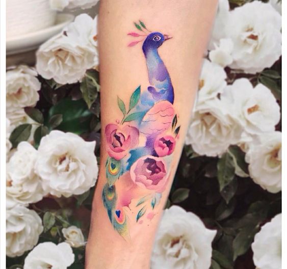 Peacock tattoo for women 2