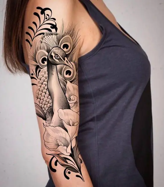 Peacock tattoo for women 3