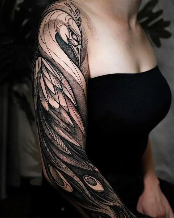 Peacock tattoo for women 4