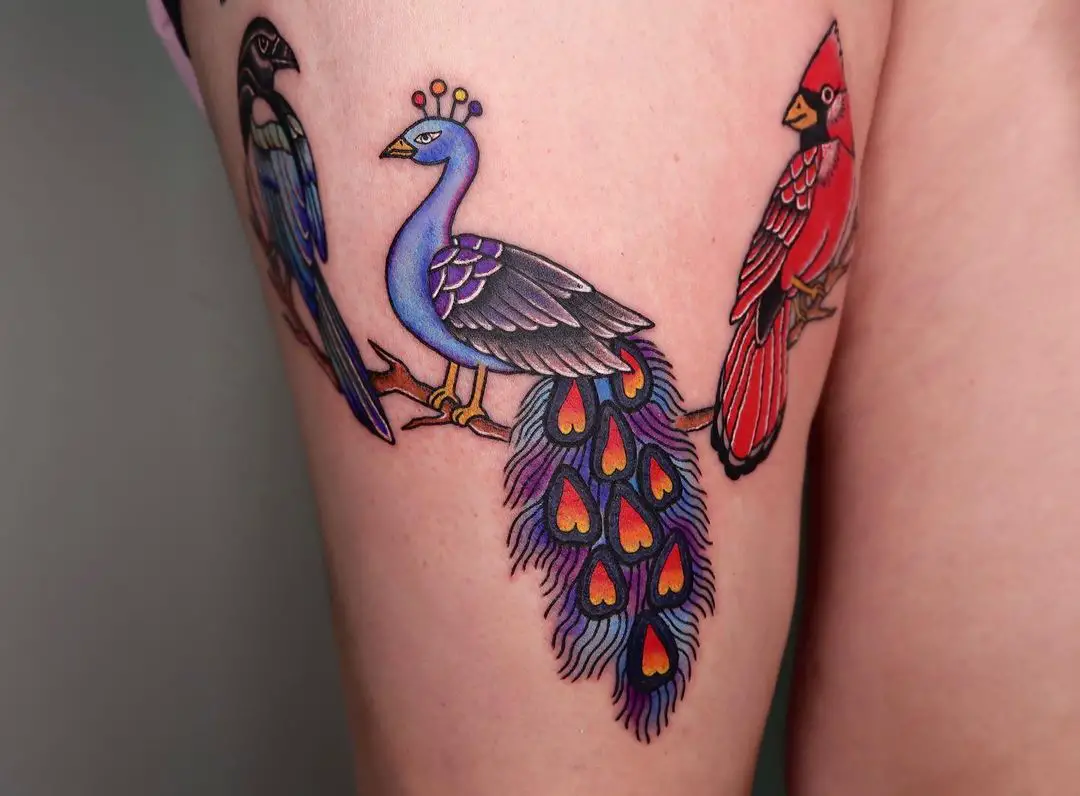 Peacock tattoo on thigh by ann tattooo