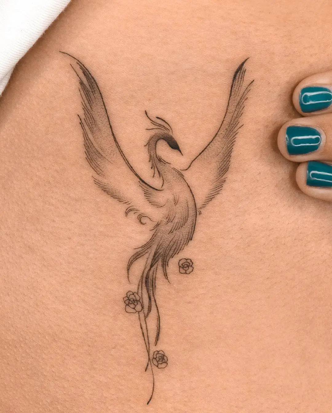 Phoenix tattoo for women by choiyun tattoo