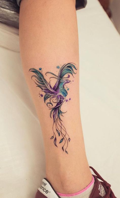 Phoenix tattoo on leg 1