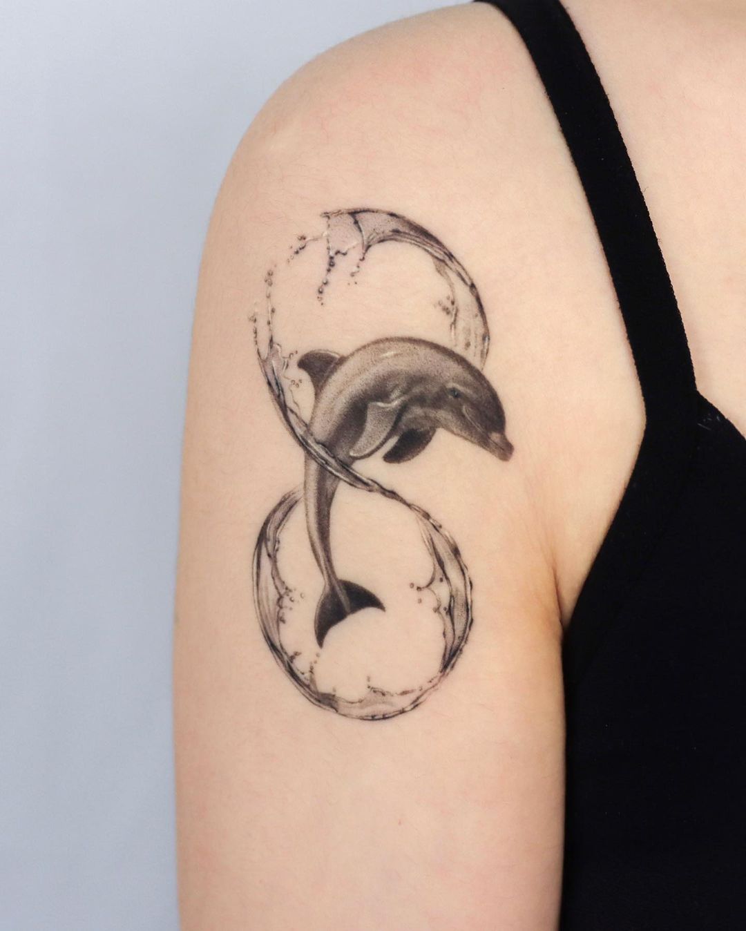 Realistic dolphin tattoo by start.your .line