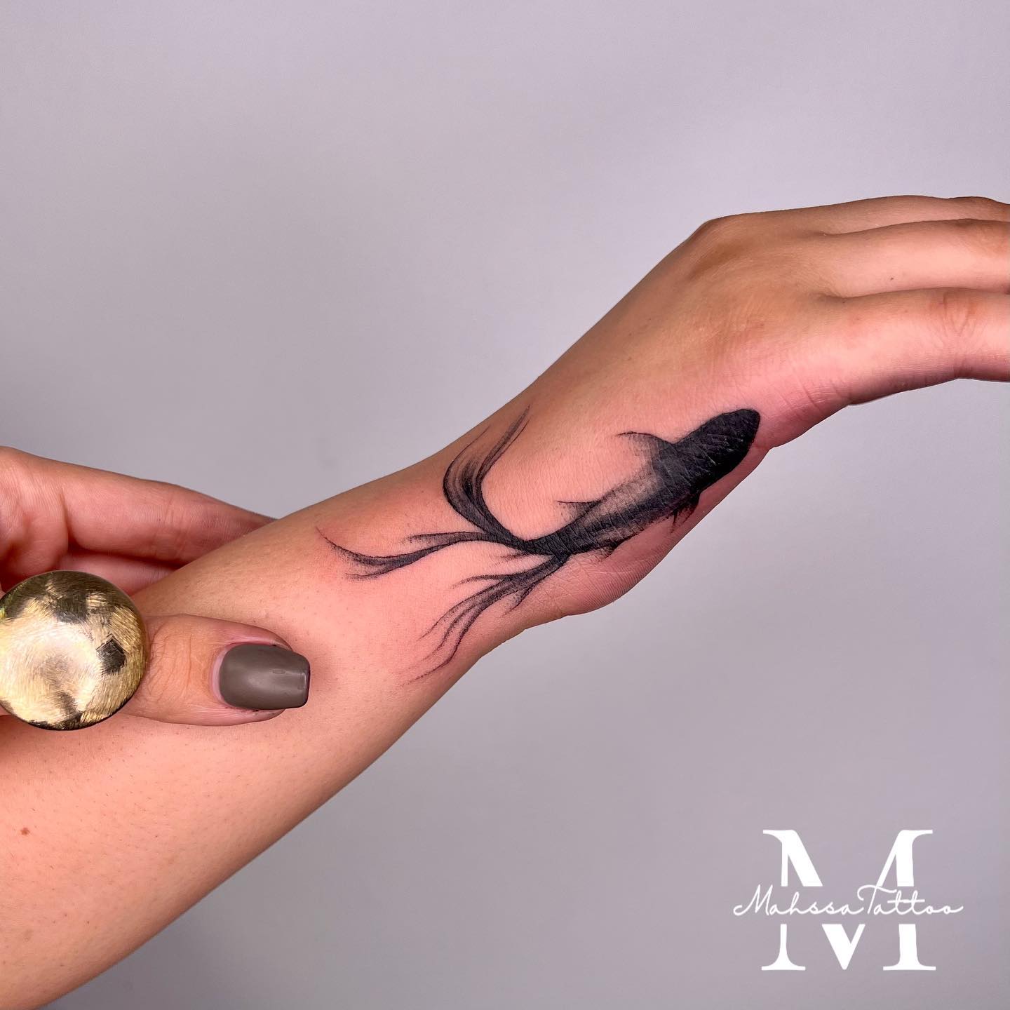 Realistic fish tattoo by mahssatattoo