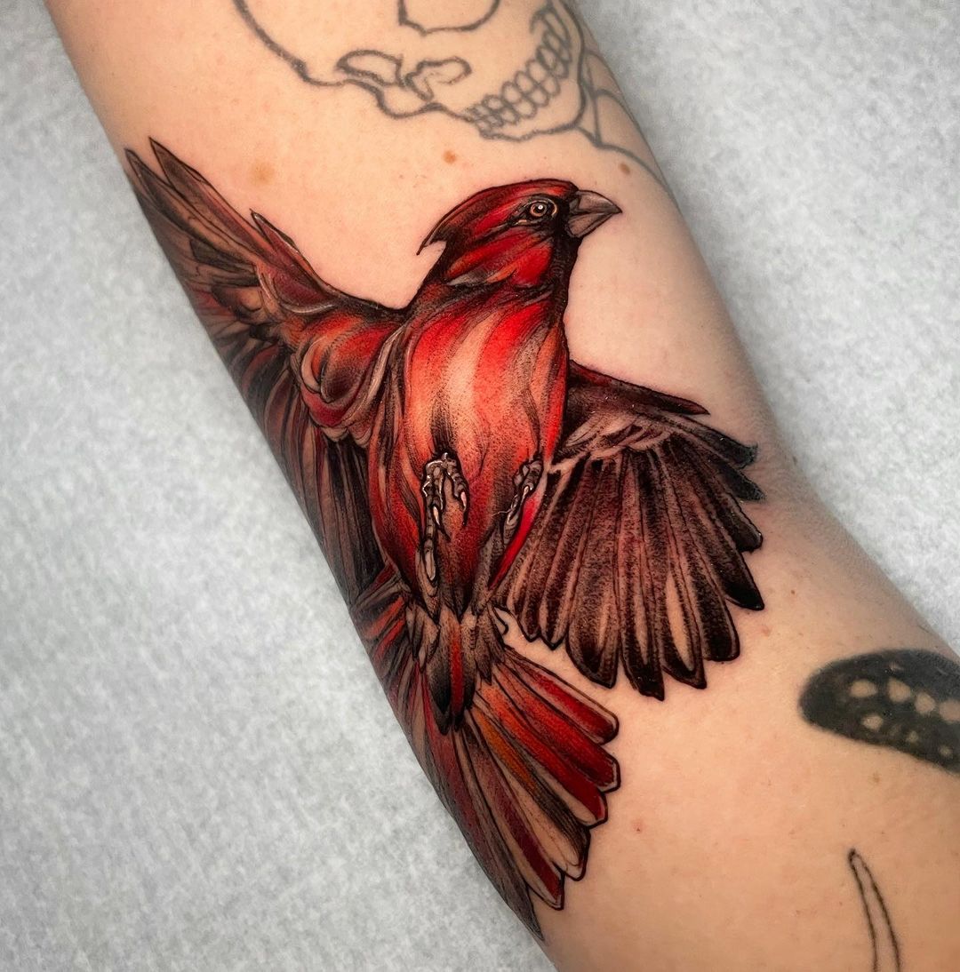 Red bird tattoo by danilo.vivanco.tattoo