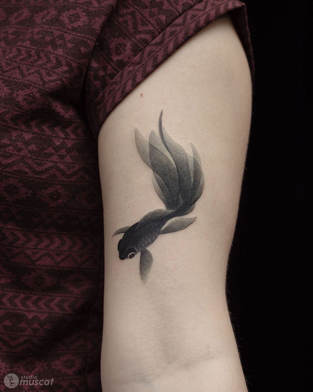 Simple fish tattoo by studiomuscat