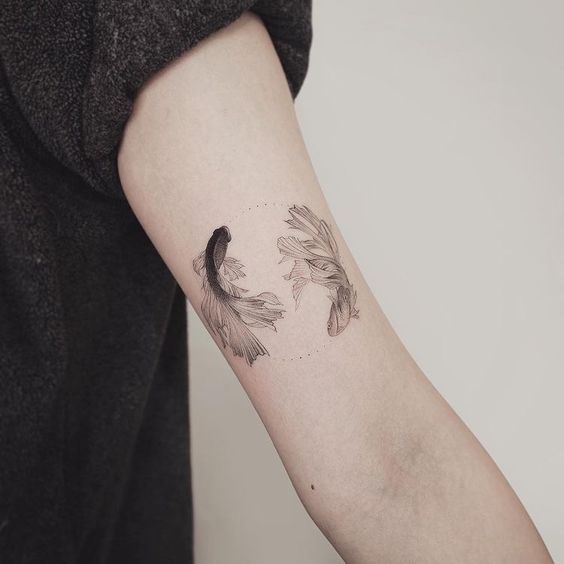 Simple fishes tattoo 1