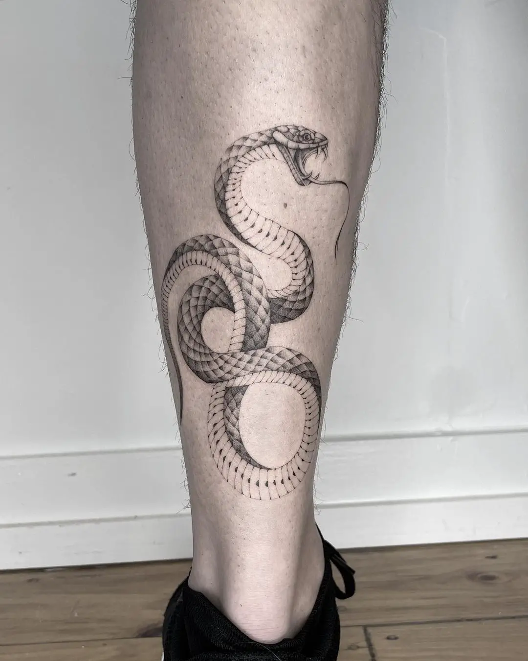 Simple snake tattoo by megwahh