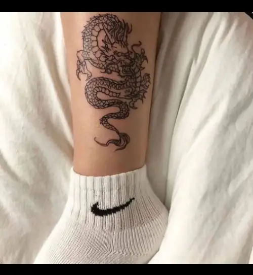 Small dragon tattoo by highertattz