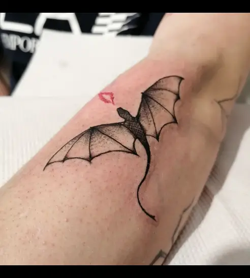 Small dragon tattoo by painsbeautytatts