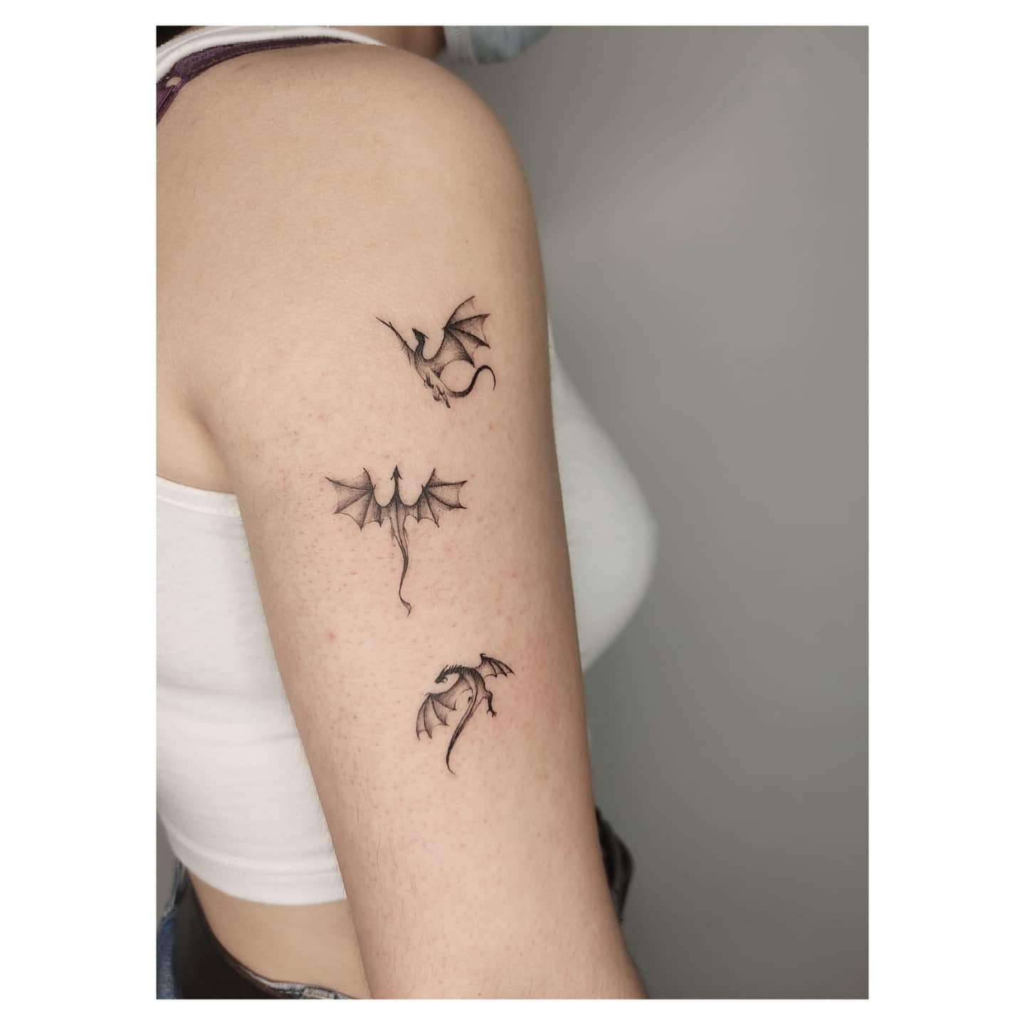 Small dragons tattoo by marconuve