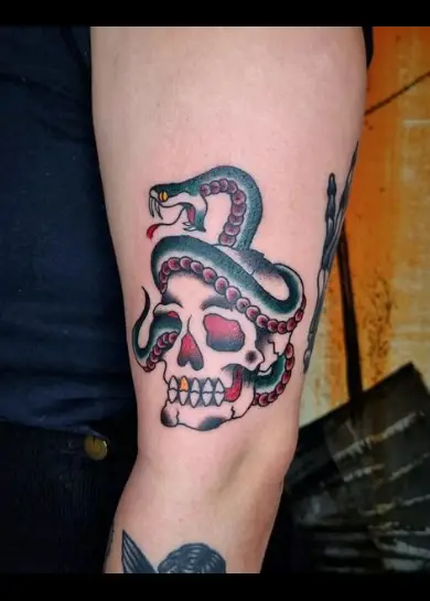Snake and skull tattoo by lipastinks