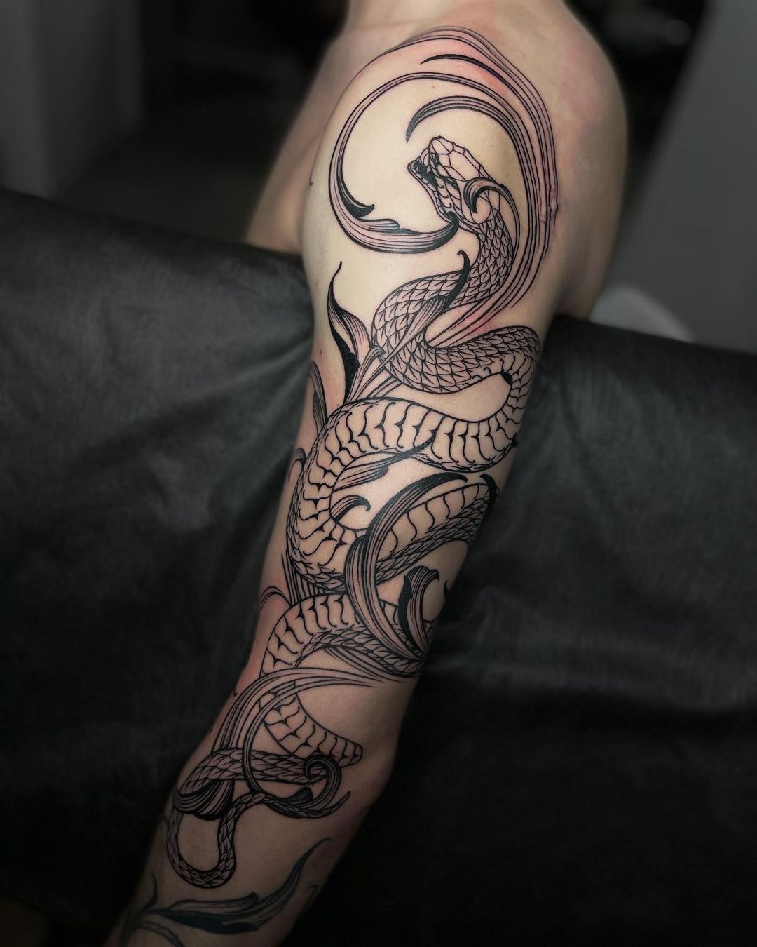 Snake tattoo for men by ungoliant.art