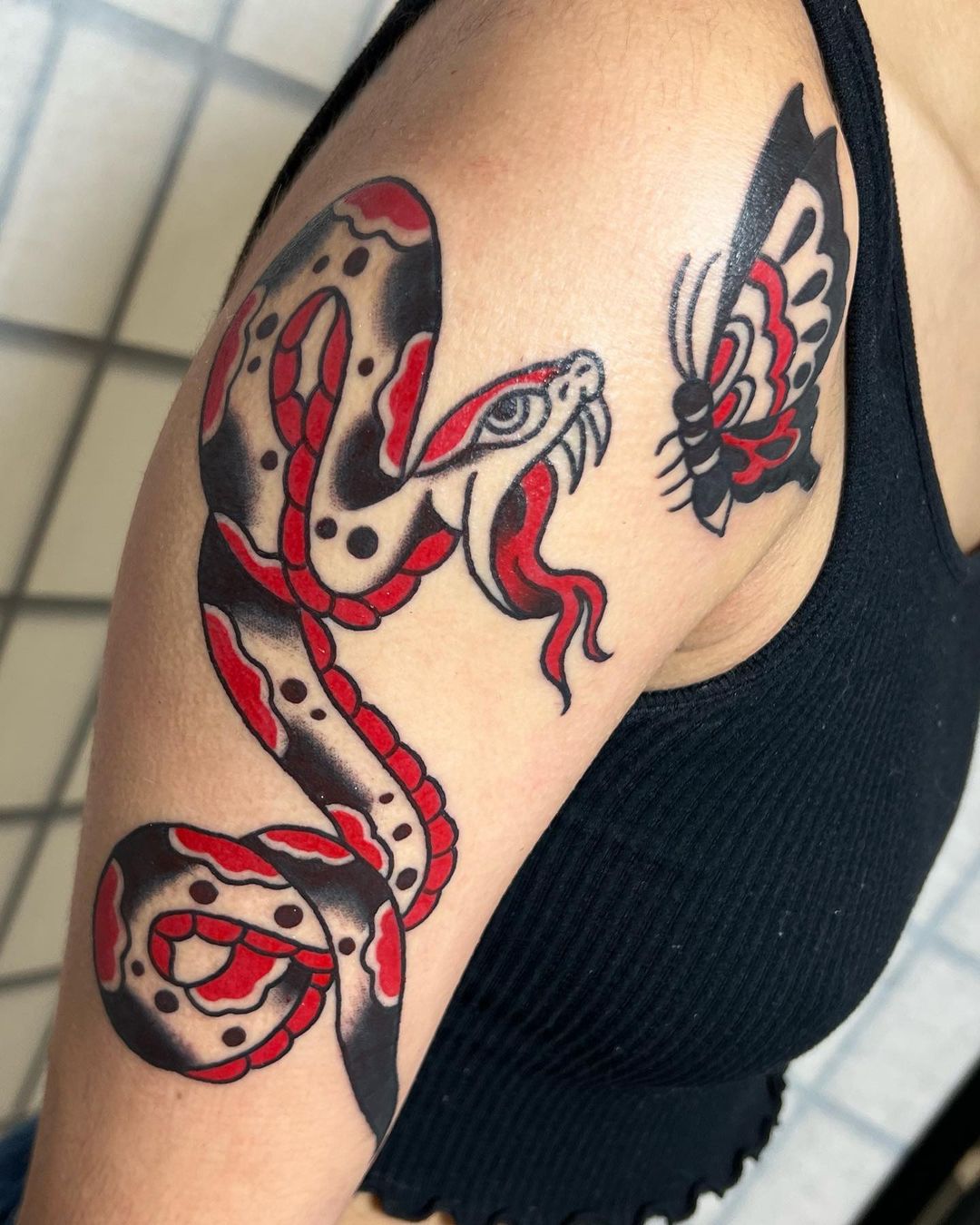 Snake tattoo for women by cody abell