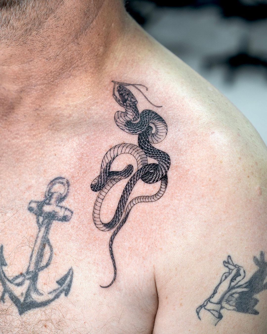 Snake tattoo on shoulder by gemil grim