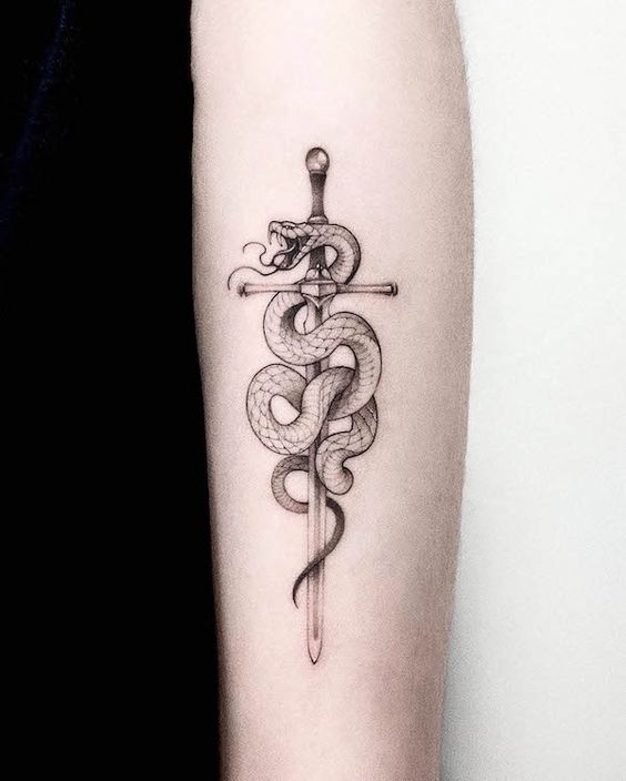 Snake with dagger tattoo 3