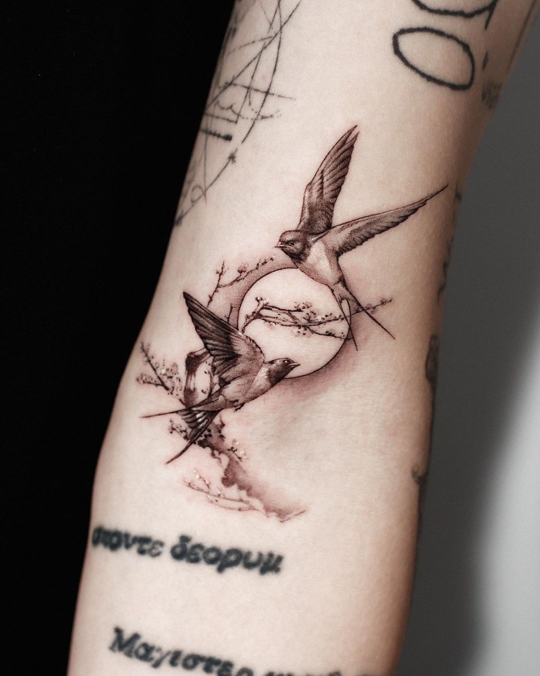 Swallow tattoo by jinkblack tattoo