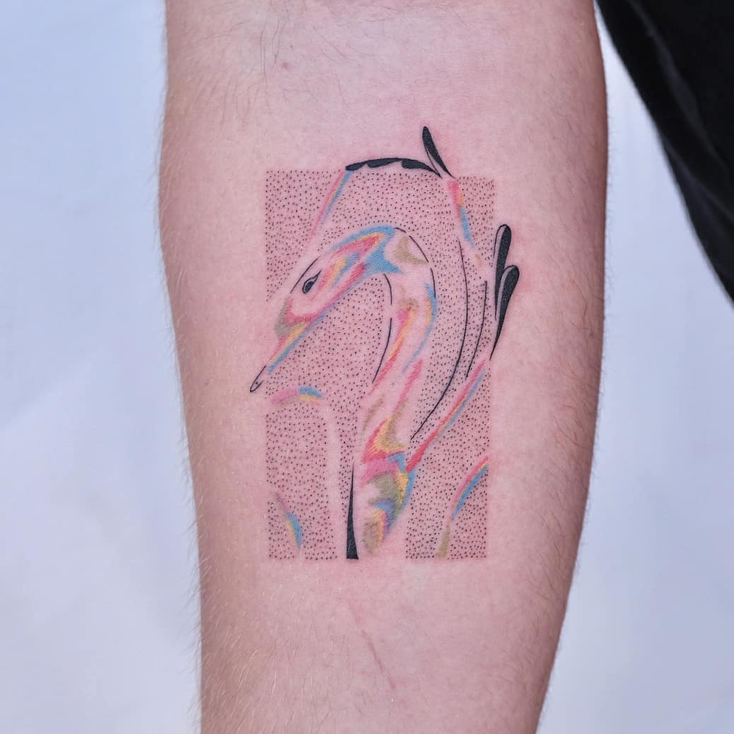 Swan tattoo on arm by bebop ink