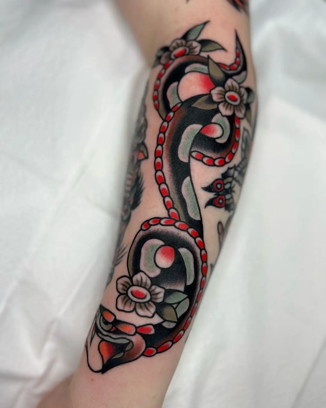 Traditiona snake tattooo by loganisaacson