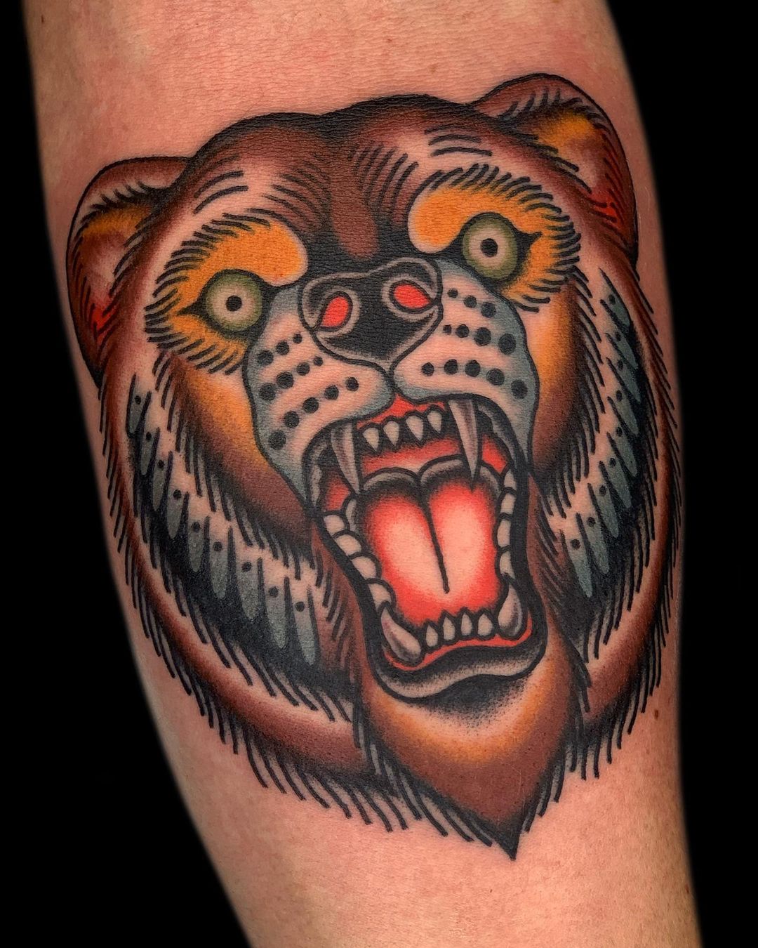Traditional bear tattoo by