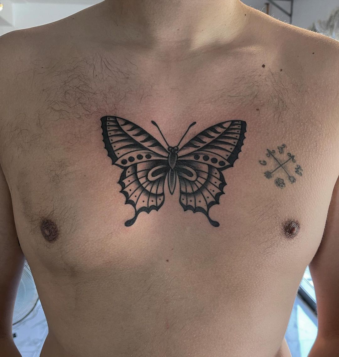 Traditional butterfly tattoo by tattoolouis