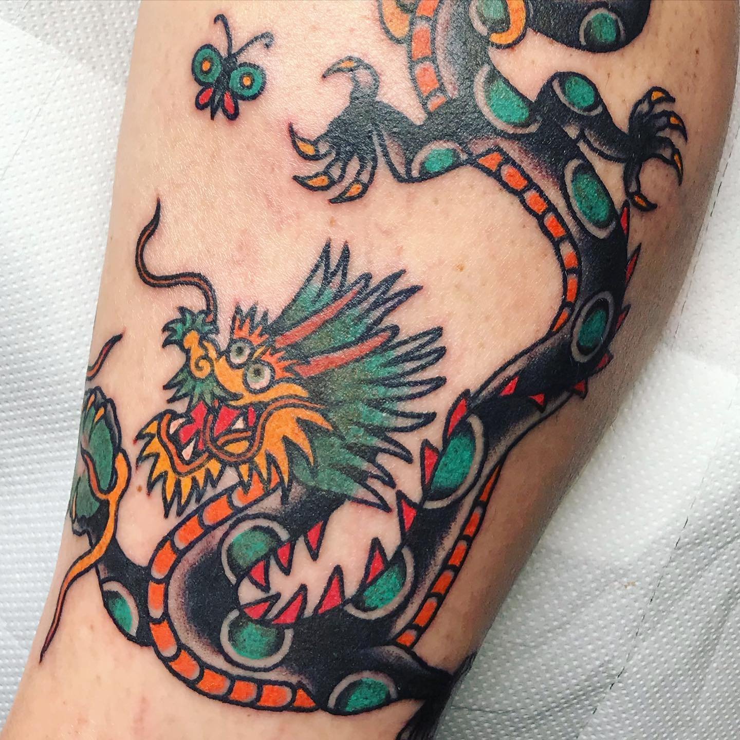 Traditional dragon tattoo by pegysue tattoos