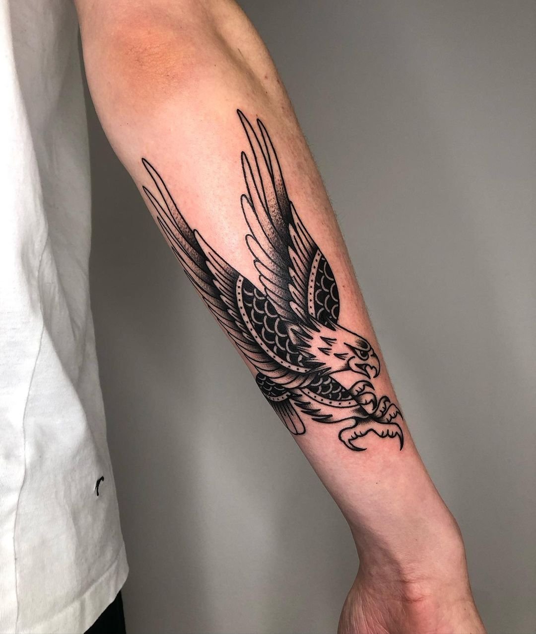 Traditional eagle tattoo by makar.tattoo