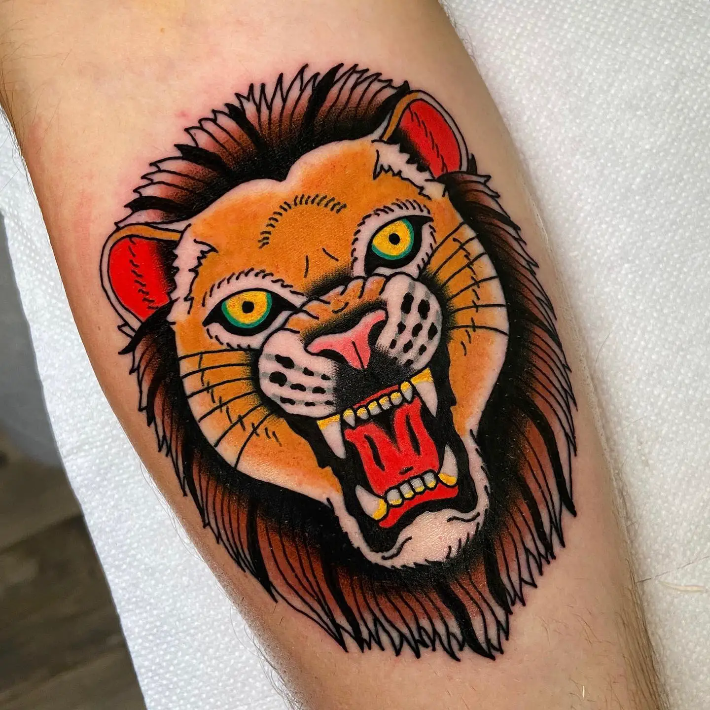 Traditional lion tattoo by emilianofranzil
