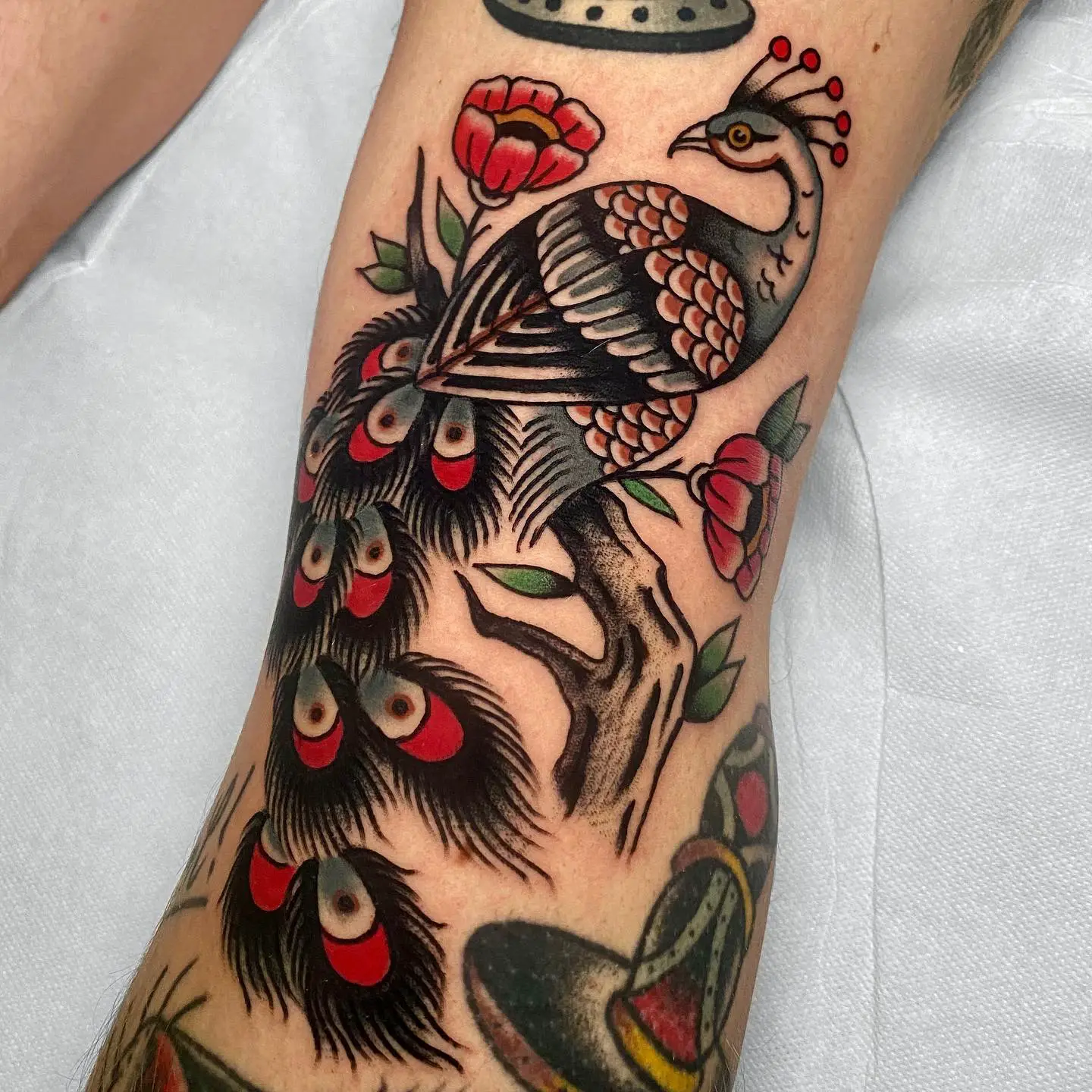 Traditional peacock tattoo by team fullgas