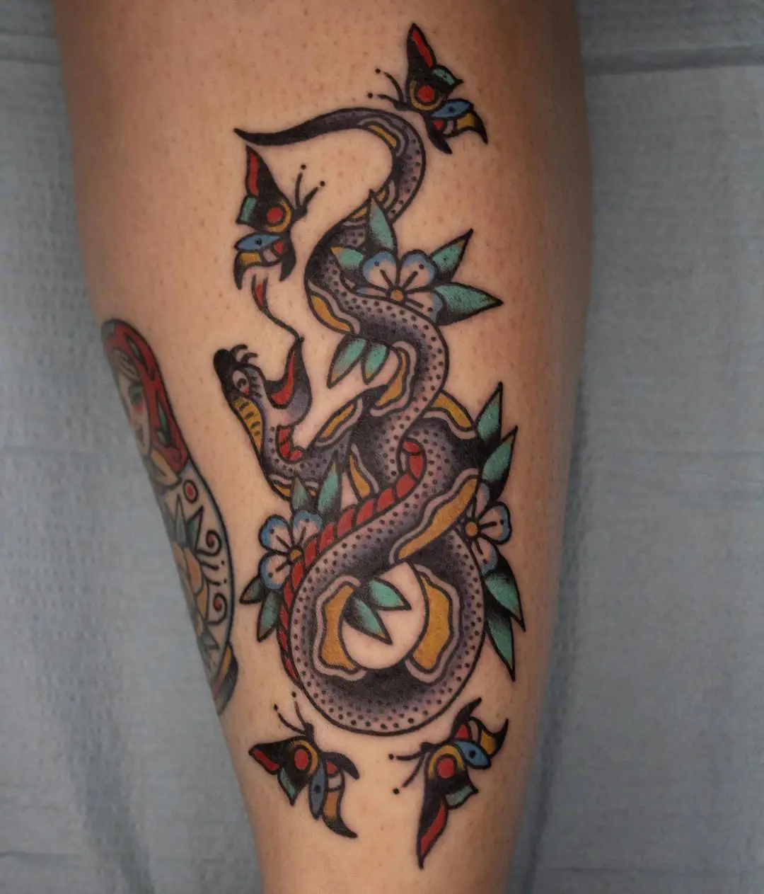 Traditional snake tattoo by sekaf ile